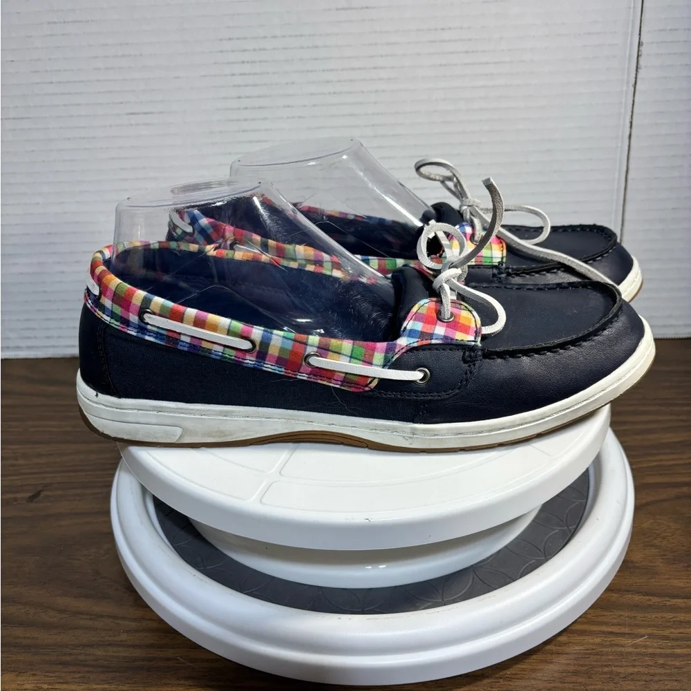 Falls Creek women’s 11 boat or deck shoes. Leather laces navy w/red & white trim